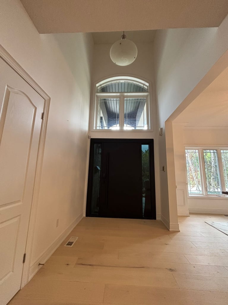 Interior hallway with black double doors